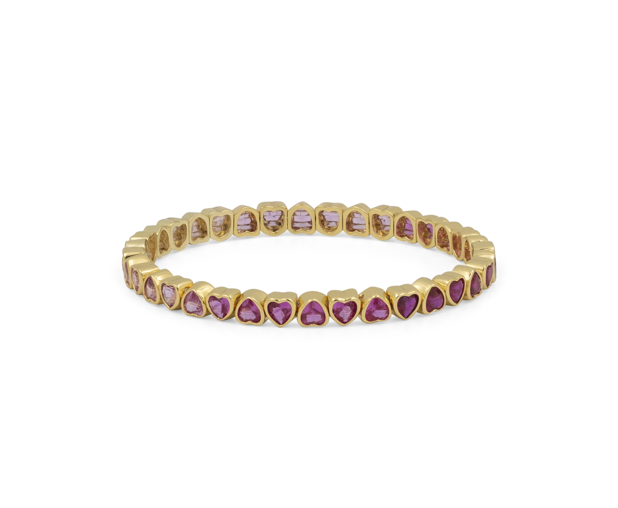 A yellow gold eternity bracelet featuring small heart-shaped purple gemstones set in a row, photographed on a clean white background.
