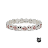 White beaded stretch bracelet with red team logos and small rhinestone-like dots.