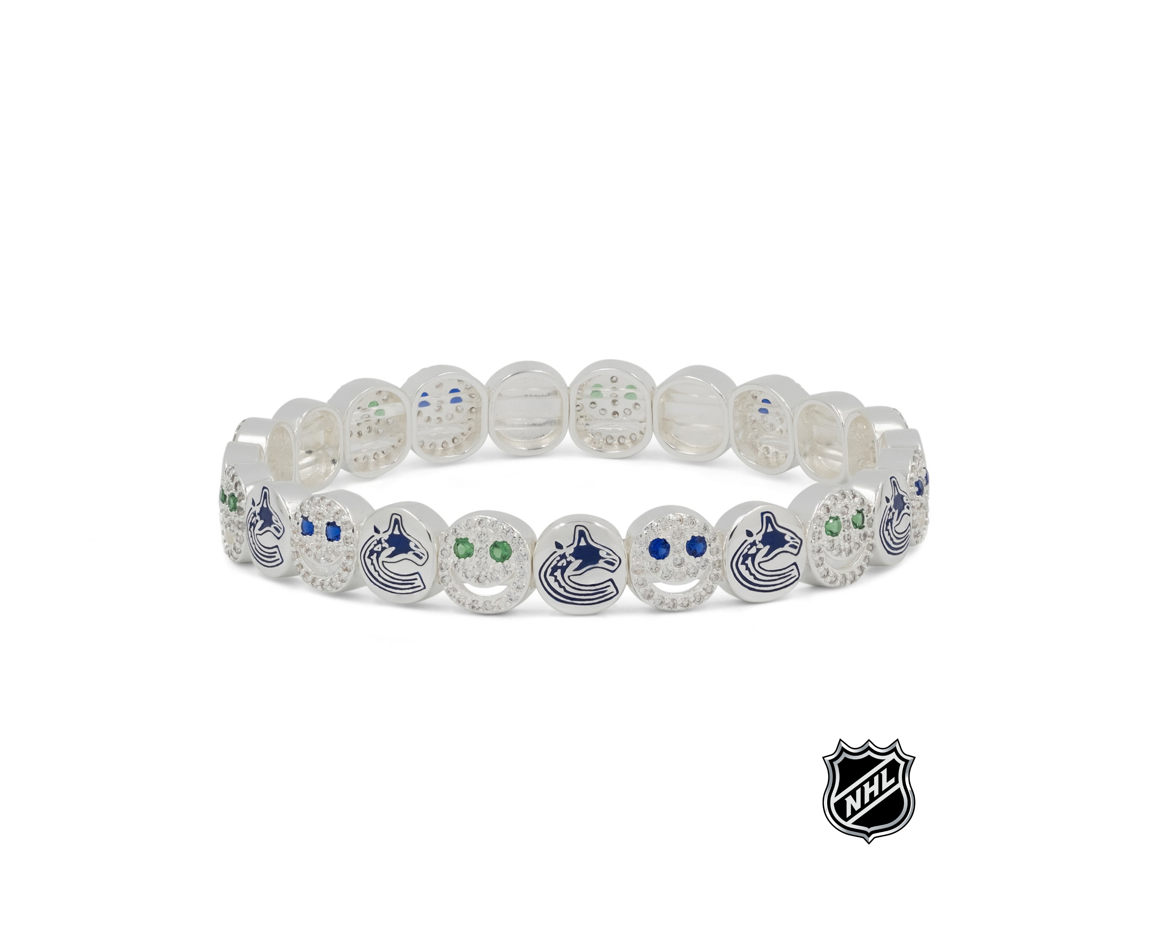 White beaded stretch bracelet with blue team logos and small green crystal-like accents.