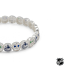 Silver-tone NHL charm bracelet with blue logo charms, crystal beads, and a round clasp