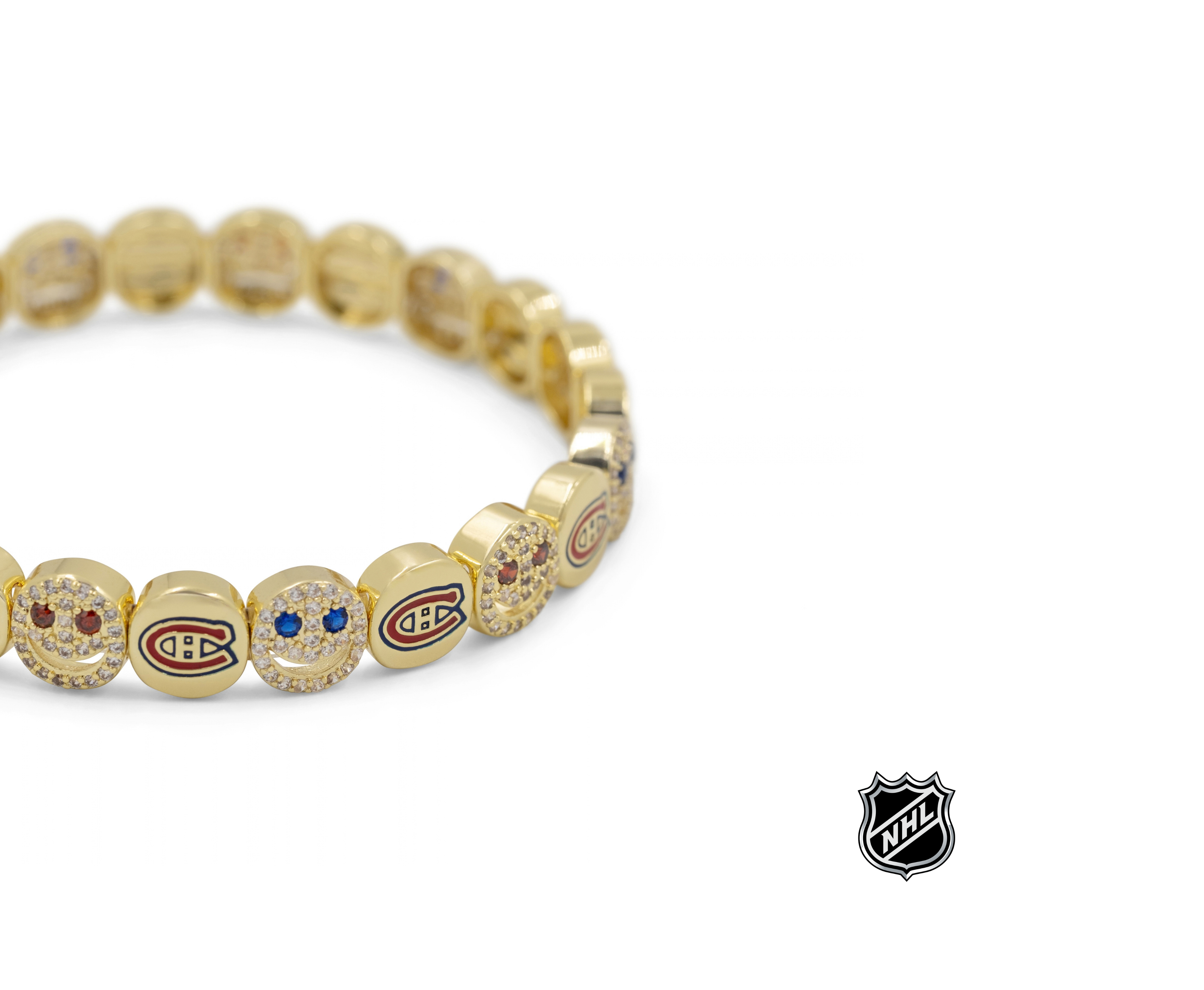 Gold-tone NHL charm bracelet with a red Canadiens C charm and blue logo bead accents