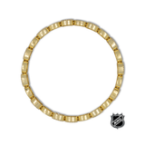 Gold-tone link bracelet with small NHL logo charm at side