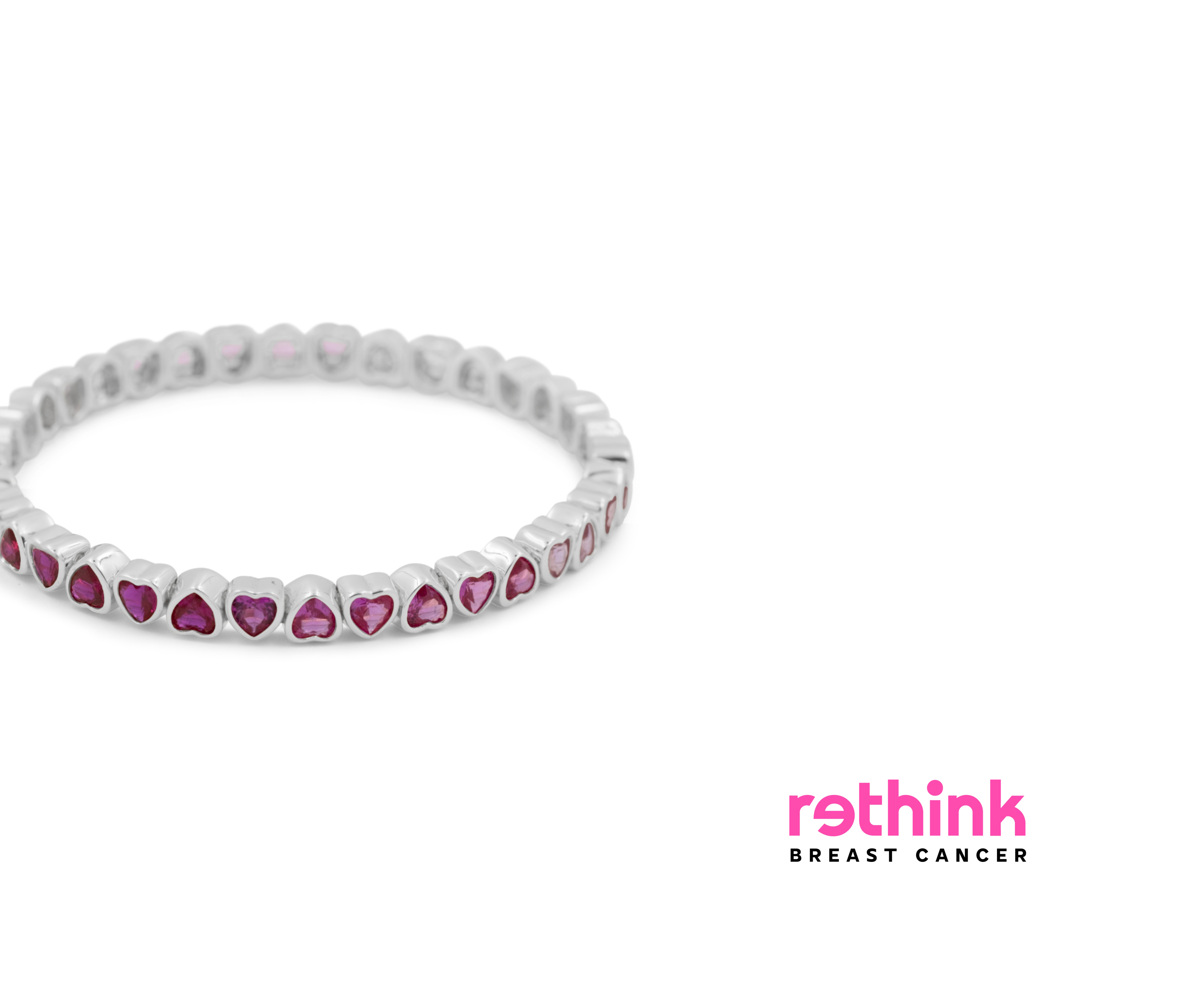 Silver heart tennis bracelet with pink heart gemstone row