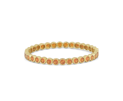 Round flex tennis bracelet in yellow gold with orange round stones