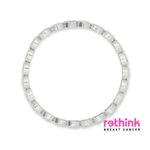 Silver pavé link bracelet with oval settings and pink stones