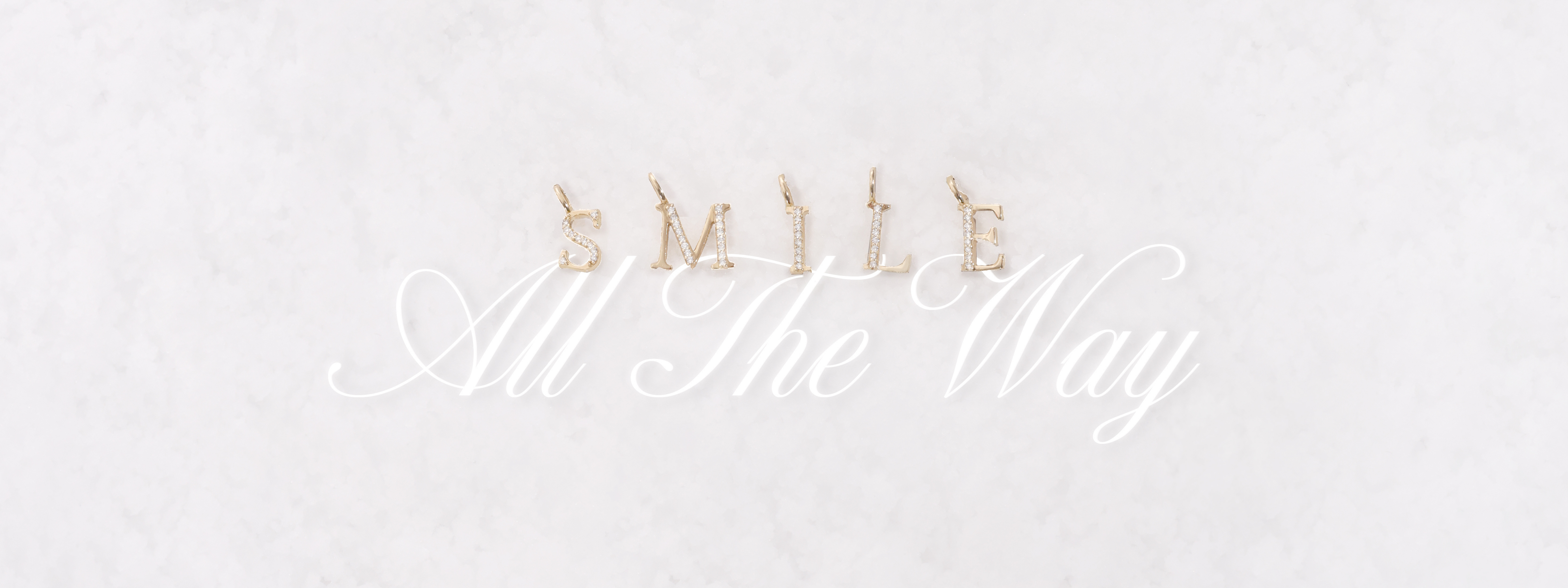 Decorative text 'SMILE All The Way' with decorative elements on a light gray background