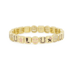 Gold bracelet for women with dallas charms on it 