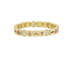 Gold bracelet with various charms on a white background