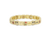 Gold bracelet with various charms on a white background
