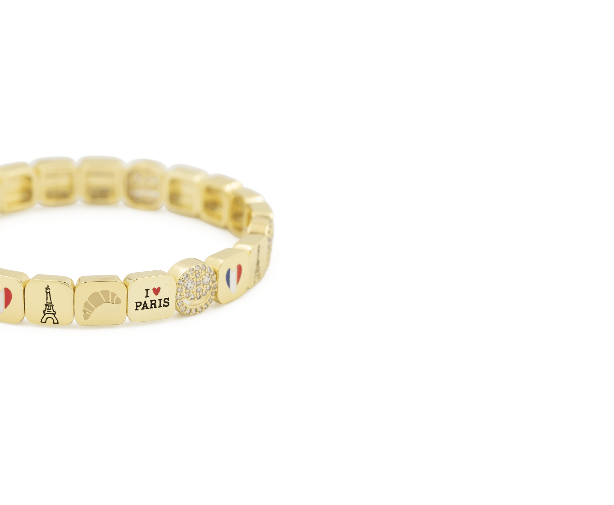 Gold beaded bracelet with various charms on a white background