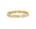 Gold bracelet with various charms on a white background