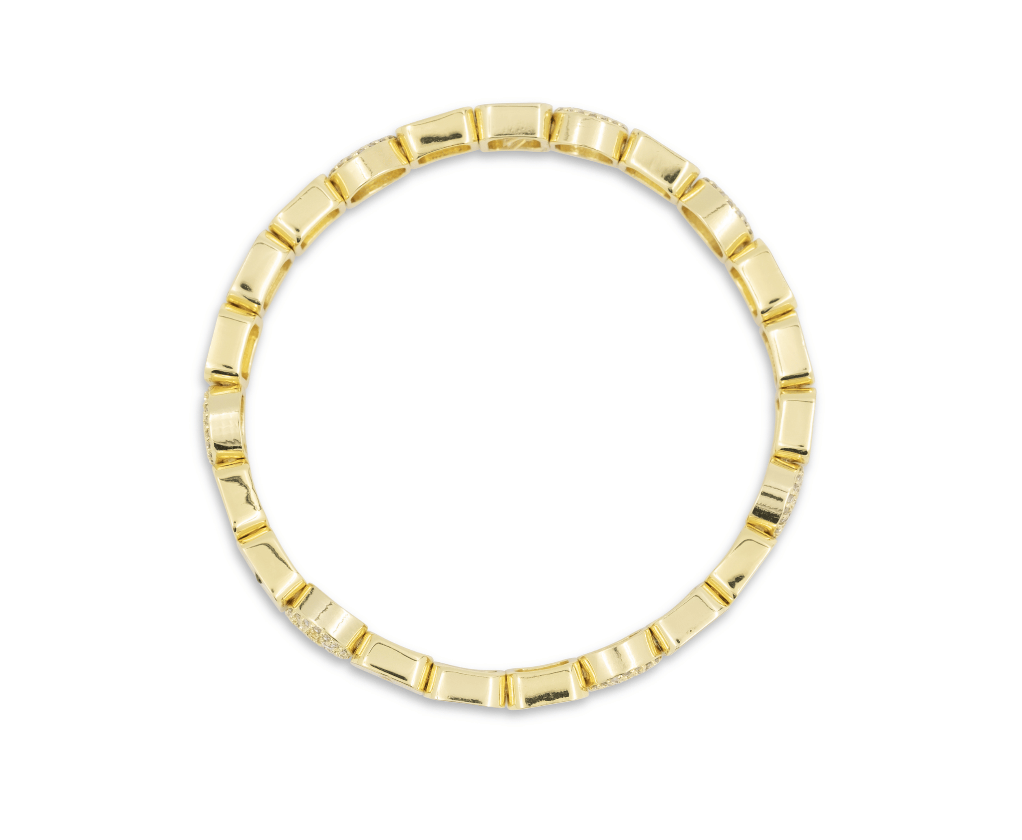 Gold ring with a beaded design on a white background