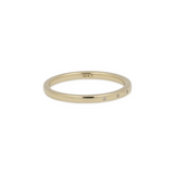 Gold ring with '10K' marking on a white background