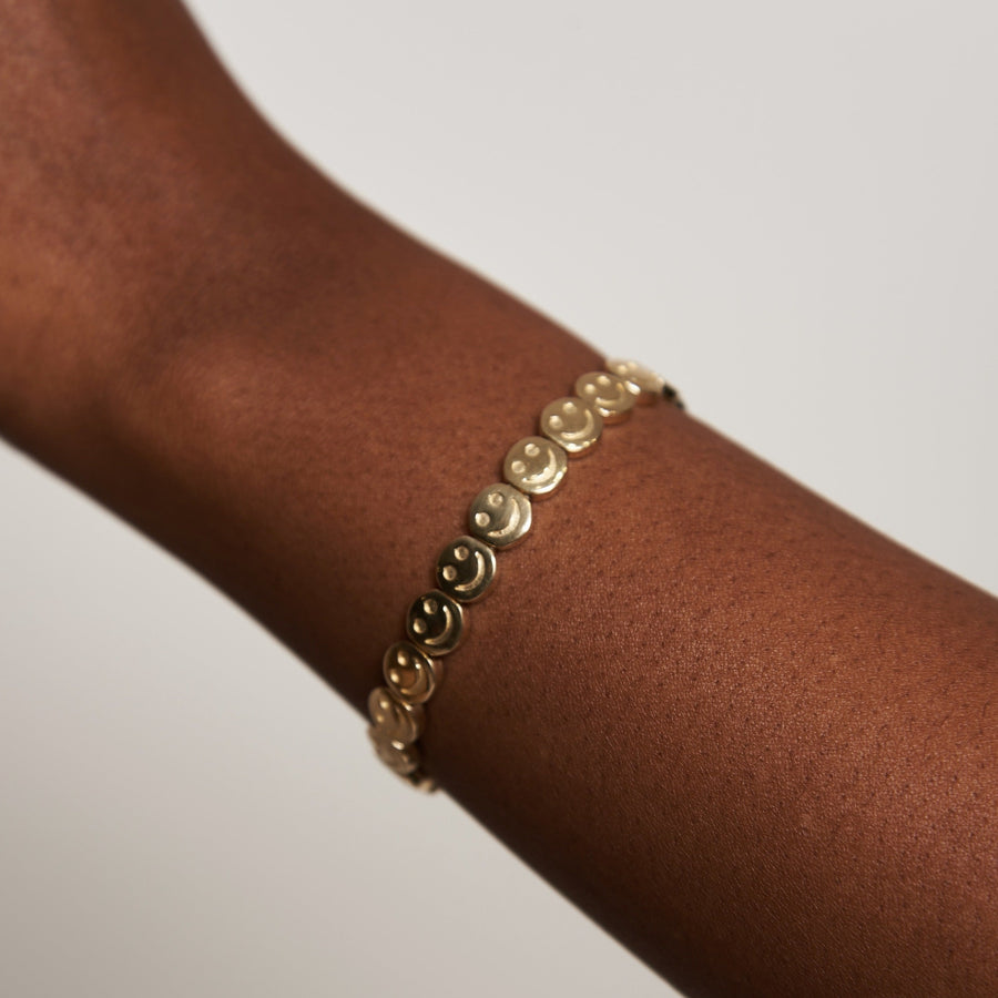 10KT ETERNAL HAPPY FACE BRACELET